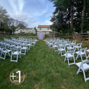 A photo of an outdoor wedding ceremony setup.